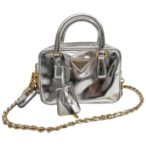 prada sling bag gold chain|Prada silver crossbody wallet.